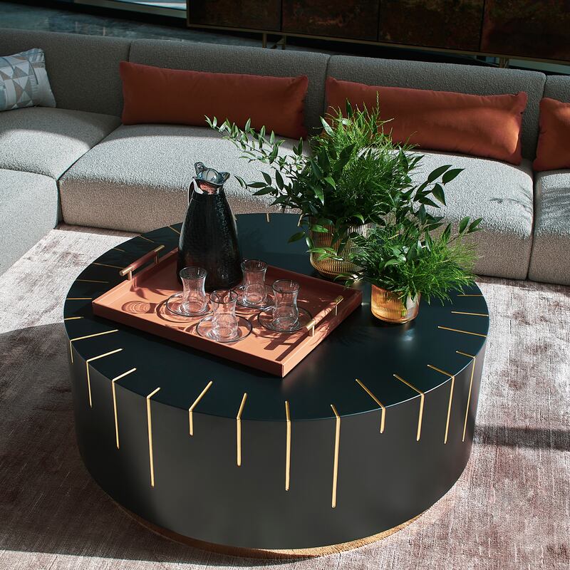 Opt for a rounded coffee table if you have young children or pets, so as to avoid any sharp corners. Photo: Aura