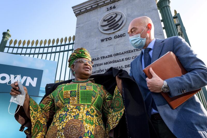 New Director-General of the World Trade Organisation Ngozi Okonjo-Iweala walks at the entrance of the WTO following a photo-op upon her arrival at the WTO headquarters to take an office in Geneva, Switzerland March 1, 2021. Fabrice Coffrini/Pool via REUTERS