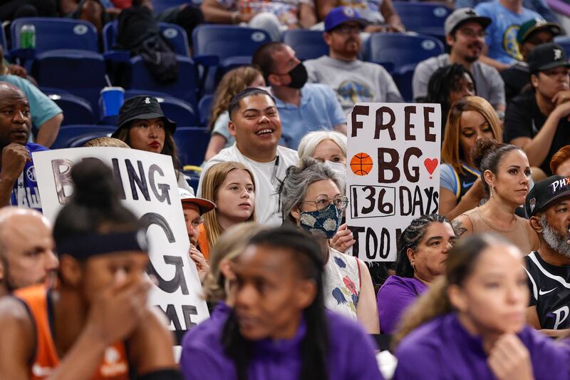 Fans hold signs Griner during the first half of the WNBA game between the Chicago Sky and Phoenix Mercury at Wintrust Arena in Chicago, Illinois. EPA