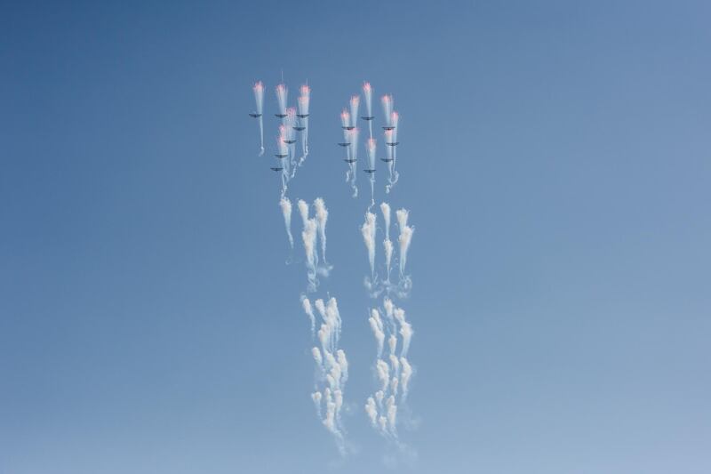 Aircraft peform a fly-by during a mass rally on Kim Il Sung square in Pyongyang on September 9, 2018. - North Korea held a military parade to mark its 70th birthday, but refrained from showing off the intercontinental ballistic missiles that have seen it hit with multiple international sanctions. AFP