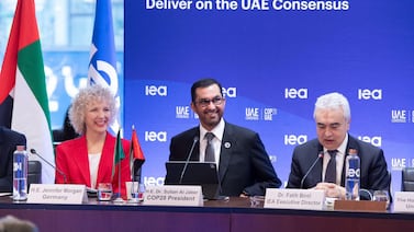 Dr Sultan Al Jaber, Cop28 President, at the International Energy Agency in Paris on Tuesday. Left, Jennifer Morgan, German climate envoy, and right, Fatih Birol, the agency's executive director. Photo: Cop28 UAE