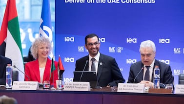 Dr Sultan Al Jaber, Cop28 President, at the International Energy Agency in Paris on Tuesday. Left, Jennifer Morgan, German climate envoy, and right, Fatih Birol, the agency's executive director. Photo: Cop28 UAE