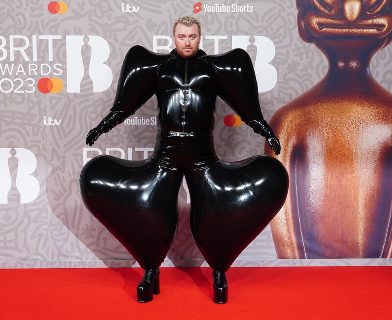 Sam Smith attending the Brit Awards 2023 at The O2 Arena, London, wearing a look by Indian designer Harri. PA