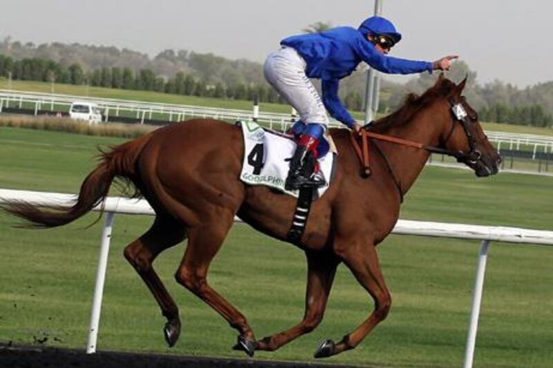 Italian jockey Lanfranco "Frankie" Dettori leads African Story to win the Godolphin Mile horse race at the Dubai World Cup, the world's richest horse race with a prize money of 10 million US dollars, in the Gulf emirate on March 31, 2012. AFP PHOTO/KARIM SAHIB

