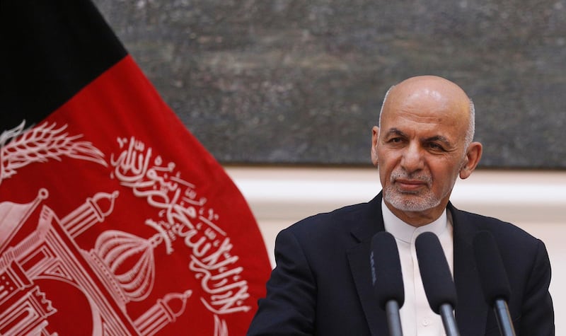 epa08225806 (FILE) - Afghan President, Ashraf Ghani talks with journalists during a joint press conference with US secretary of state, Mike Pompeo (not seen) at the presidential palace, Kabul, Afghanistan, 09 July 2018 (reissued 18 February 2020). According to reports citing the Independent Election Commission (IEC), Ghani has won the Afghan presidential election.  EPA/HEDAYATULLAH AMID *** Local Caption *** 55165451