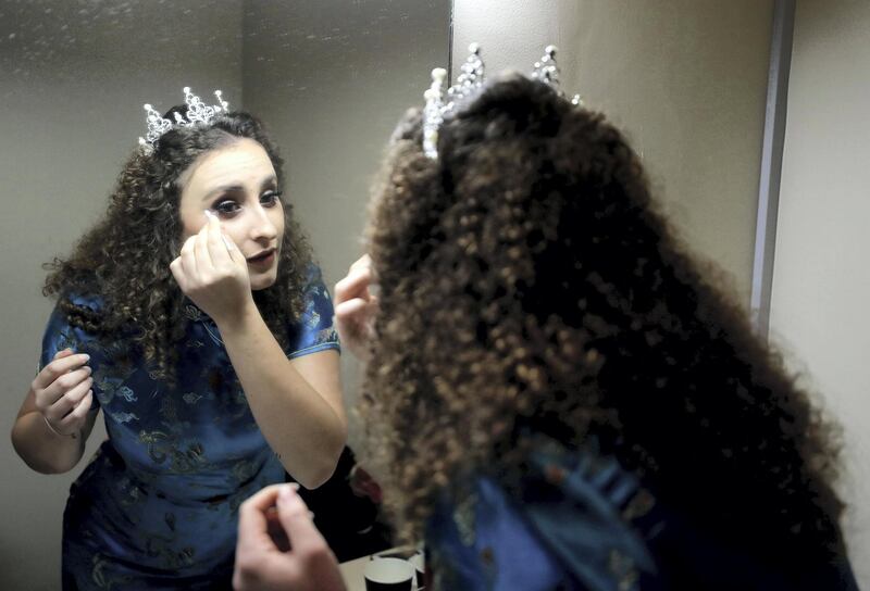 Dubai, United Arab Emirates - December 19, 2018: Ophelia Mancini who plays Princess Jasmine puts on her make up. The Madinat Theatre is putting on the pantomime Aladdin over the Xmas holidays. Wednesday the 19th of December 2018 at the Madinat Theatre, Dubai. Chris Whiteoak / The National