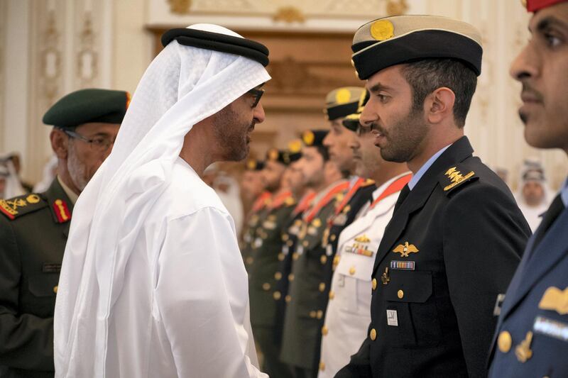 ABU DHABI, UNITED ARAB EMIRATES - April 08, 2019: HH Sheikh Mohamed bin Zayed Al Nahyan, Crown Prince of Abu Dhabi and Deputy Supreme Commander of the UAE Armed Forces (L), presents an Emirates Military Medal to HH Sheikh Mohamed bin Suroor Al Nahyan (R), during a Sea Palace barza.

( Ryan Carter / Ministry of Presidential Affairs )
---