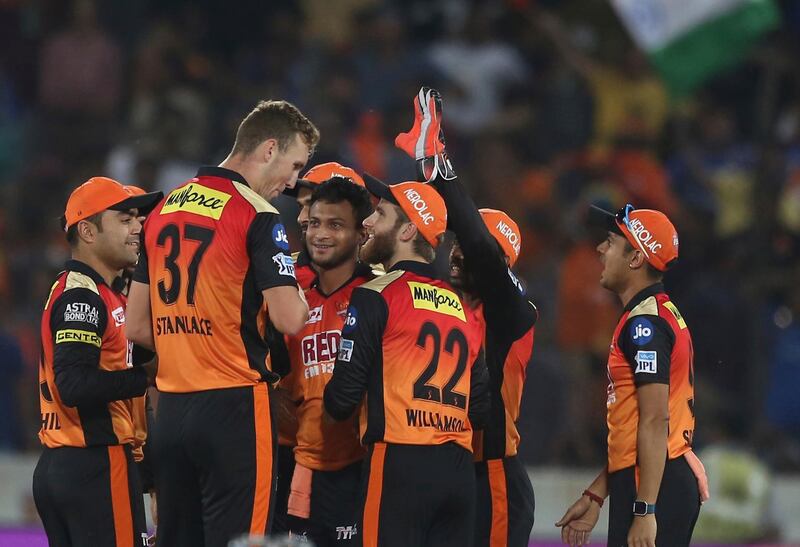 Sunrisers Hyderabad bowler Billy Stanlake, second left celebrates the wicket of Rohit Sharma with captain Kane Williamson during VIVO IPL cricket T20 match against Mumbai Indians in Hyderabad, India, Thursday, April 12, 2018. (AP Photo/Mahesh Kumar A.)