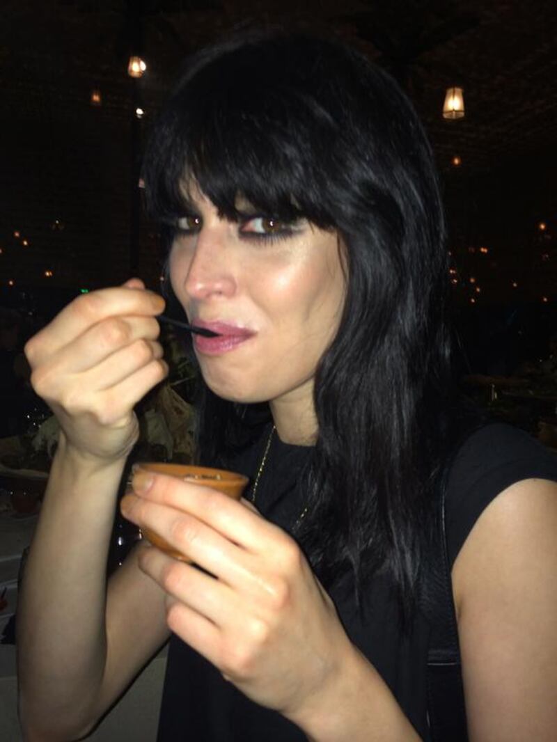 Straight off the runway, a model tucks into tabbouleh after Chanel’s Cruise Collection 2014/2015. Rebecca McLaughlin-Duane / The National