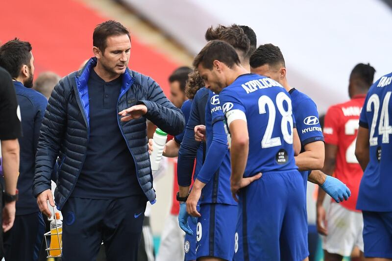 Chelsea manager Frank Lampard with his players during a drinks break. AFP