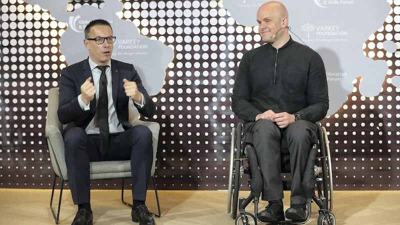 Olivier Oullier, president of Emotiv, left, and Mark Pollock are working together to develop technologies that could help people with paralysis regain mobility. Pawan Singh / The National     
