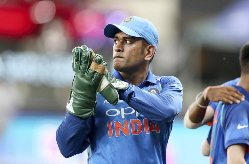 DUBAI , UNITED ARAB EMIRATES, September 19 , 2018 :- MS Dhoni , wicketkeeper of India after the first inning during the  Asia Cup UAE 2018 cricket match between Pakistan vs India held at Dubai International Cricket Stadium in Dubai. ( Pawan Singh / The National )  For Sports. Story by Paul 