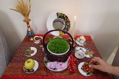 A Nawroz table often includes seven food items that start with 's' in Farsi. AFP