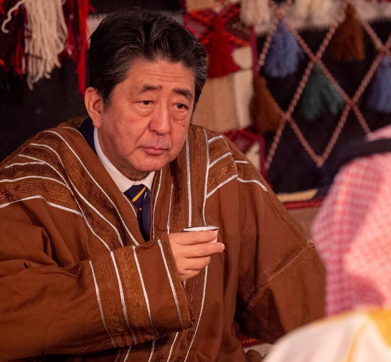 Mr. Abe wears a traditional costume as he meets with Crown Prince Mohammed bin Salman in Riyadh.