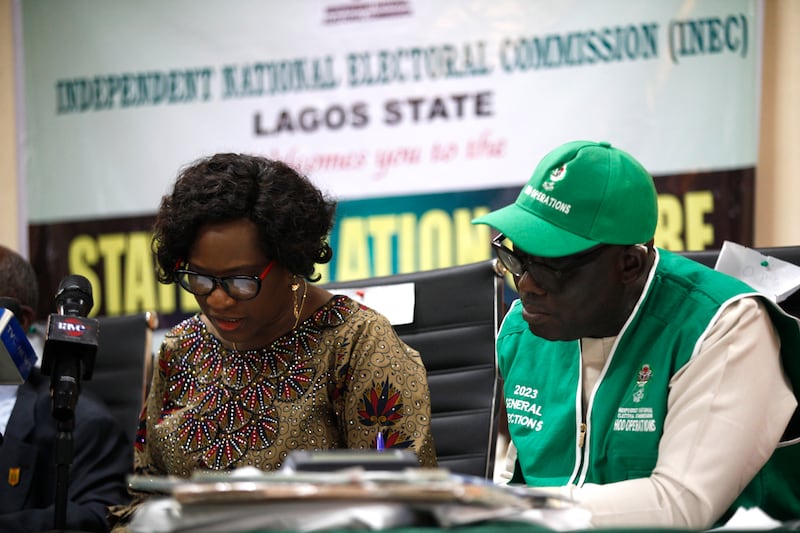 Polling officers collate the results at the electoral commission's office in Lagos. EPA