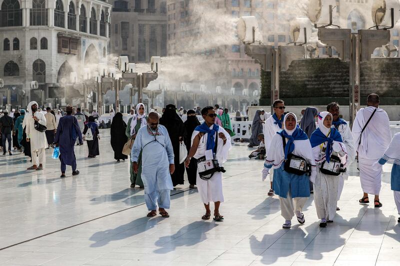 Fans spray water vapour to cool pilgrims at the Grand Mosque in Makkah. AFP