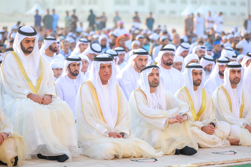 Sheikh Saud bin Saqr Al Qasimi, Ruler of Ras Al Khaimah, and Sheikh Mohammed bin Saud Al Qasimi, the emirate's Crown Prince, perform Eid prayers. Wam