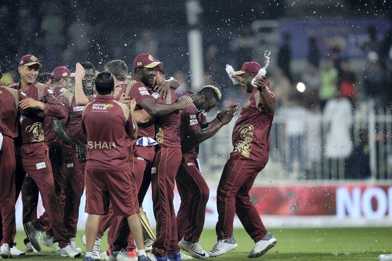 Sharjah, United Arab Emirates - December 02, 2018: Warriors celebrates winning the trophy after the game between between Pakhtoons and Northern Warriors in the T10 final. Sunday the 2nd of December 2018 at Sharjah cricket stadium, Sharjah. Chris Whiteoak / The National