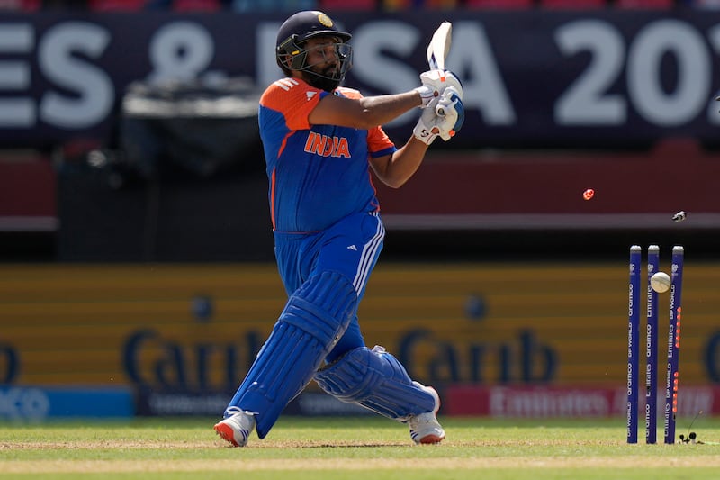 India's captain Rohit Sharma is bowled out by Adil Rashid. AP