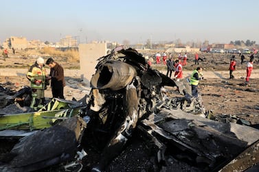 Debris at the scene where Ukraine International Airlines Flight 752 came down in Shahedshahr, south-west of Tehran, in January 2020. AP