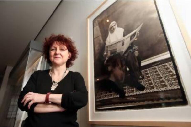 Venetia Porter, the Middle East curator at the British Museum with a photograph from Iran by Shadi Ghadirian. Stephen Lock / The National