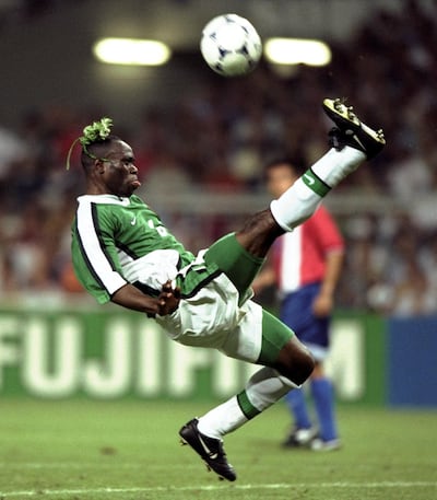 24 Jun 1998:  Taribo West of Nigeria tries an overhead kick during the World Cup group D game against Paraguay at the Stade Municipal in Toulouse, France. Nigeria lost 3-1. \ Mandatory Credit: Stu Forster /Allsport