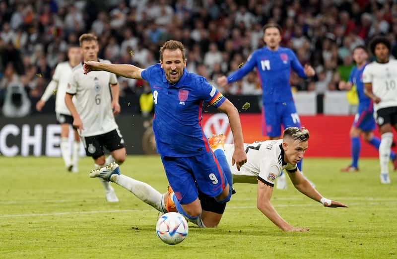 Kane is fouled by Germany's Nico Schlotterbeck, resulting in a penalty after a VAR review. PA