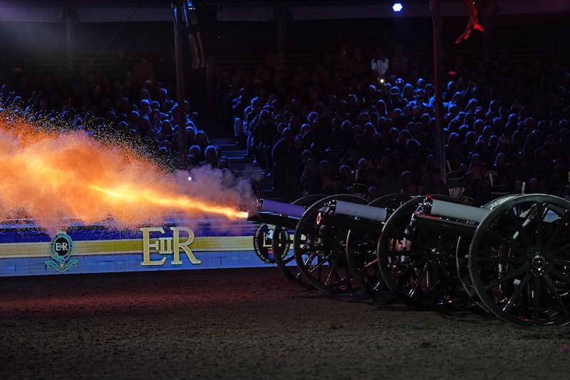 The King's Troop fire cannon as part of the celebrations. PA