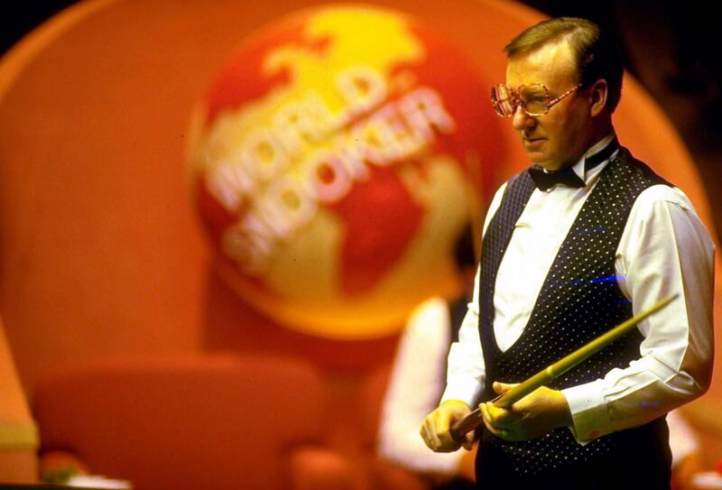 1991:  Dennis Taylor of Northern Ireland studies the table during the Embassy World Snooker Championships at the Crucible Theatre in Sheffield, England. \ Mandatory Credit: Howard  Boylan/Allsport/Getty Images