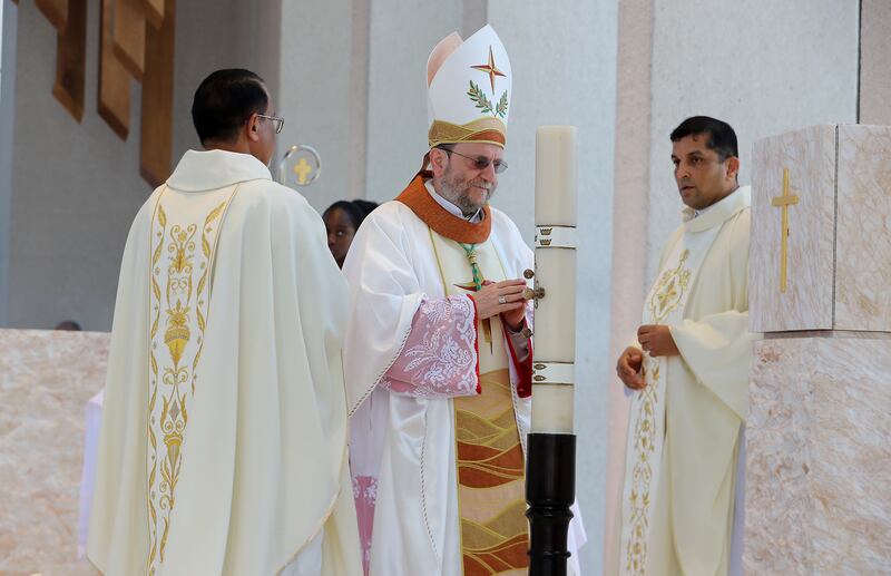 Bishop Martinelli delivers the Easter service. Pawan Singh / The National
