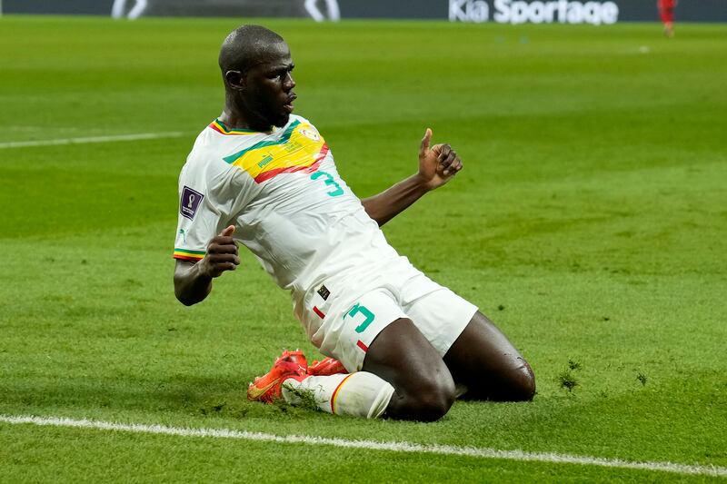 Senegal's Kalidou Koulibaly celebrates scoring the winner. AP