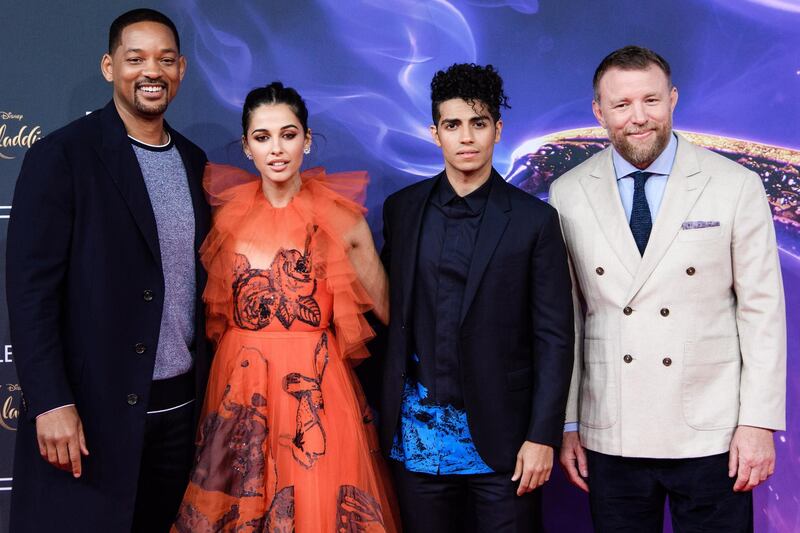 Smith, Scott, Massoud and director Guy Ritchie cosy up at the Berlin premiere.  EPA.