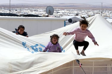 The sprawling Zaatari refugee camp in northern Jordan, near the border with Syria, provides shelter to about 100,000 Syrian refugees. Jordan is home to more than 500,000 such refugees. Khalil Mazraawi / AFP