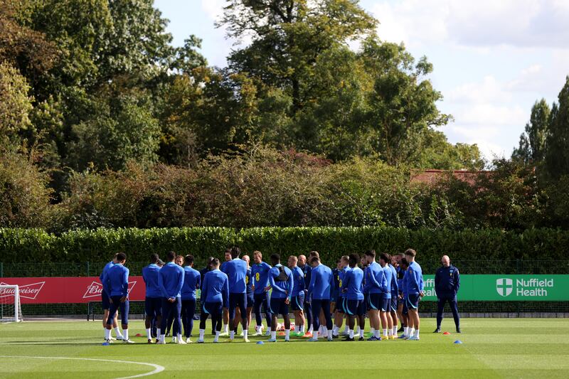 England manager Gareth Southgate speaks to his players during training. Getty