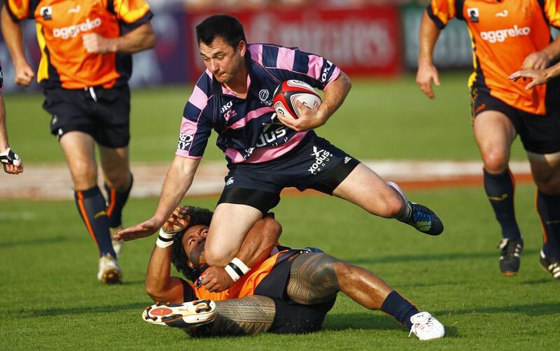 Dereck Lee of Xodus Steelers in action at Dubai Rugby Sevens. Jake Badger for The National

