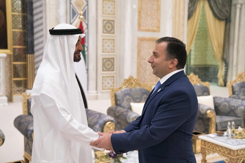ABU DHABI, UNITED ARAB EMIRATES - May 20, 2018: HH Sheikh Mohamed bin Zayed Al Nahyan Crown Prince of Abu Dhabi Deputy Supreme Commander of the UAE Armed Forces (L), receives a foreign Ambassador (R), during an iftar reception at the Presidential Palace. 

( Hamad Al Kaabi / Crown Prince Court - Abu Dhabi )
---