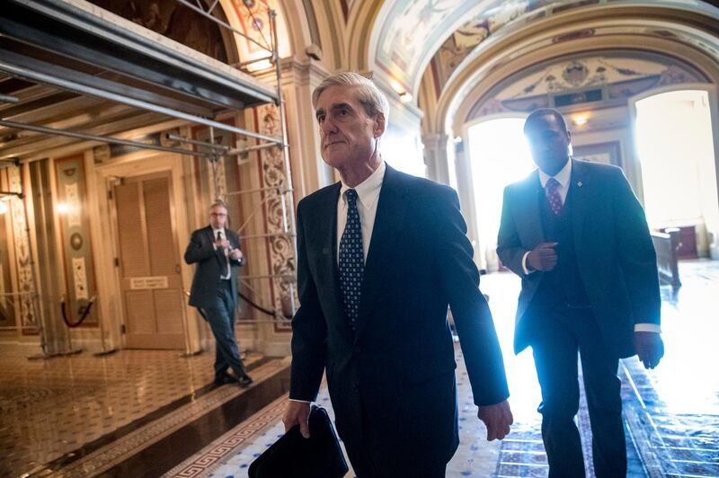 FILE - In this June 21, 2017, file photo, Special Counsel Robert Mueller departs after a closed-door meeting with members of the Senate Judiciary Committee about Russian meddling in the election at the Capitol in Washington. A year into his investigation, special counsel Robert Mueller is everywhere and nowhere at the same time. In that time, the breadth and stealth of his investigation has rattled the White House and its chief occupant, and has spread to Capitol Hill, K Street, foreign governments and, as late as last week, corporate boardrooms. (AP Photo/J. Scott Applewhite, File)