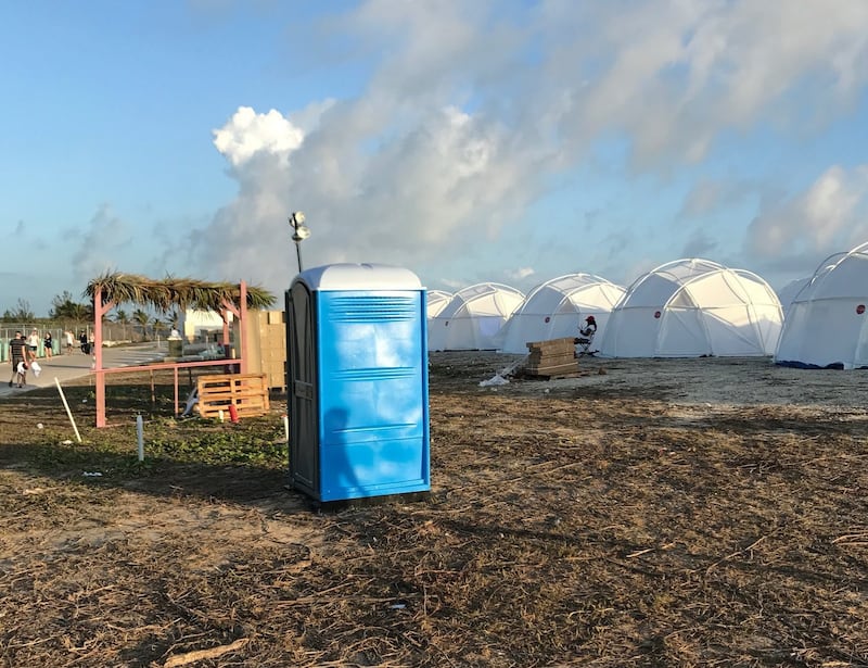 The tents and a portable toilet set up for attendees for the Fyre Festival in the Exuma islands. Organisers of the much-hyped music festival in the Bahamas canceled the weekend event at the last minute after many people had already arrived and spent thousands of dollars on tickets and travel. AP