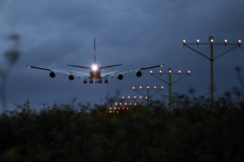 An Airbus SE A380 aircraft operated by Qantas Airways Ltd. approaches to land at Sydney Airport in Sydney, Australia, on Thursday, Feb. 21, 2019. Qantas' international business is bearing the brunt of higher fuel costs, which are shredding the division's profit margin. Photographer: Brendon Thorne/Bloomberg