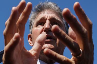Sen.  Joe Manchin, D-W. Va. , a centrist Democrat vital to the fate of President Joe Biden's $3. 5 government overhaul, updates reporters about his position on the bill, at the Capitol in Washington, Thursday, Sept.  30, 2021.  Despite months of being courted and cajoled, Sen.  Joe Manchin is still not a yes on President Joe Biden's big $2 trillion domestic package and has thrown Democrats into turmoil.  (AP Photo/J.  Scott Applewhite, File)