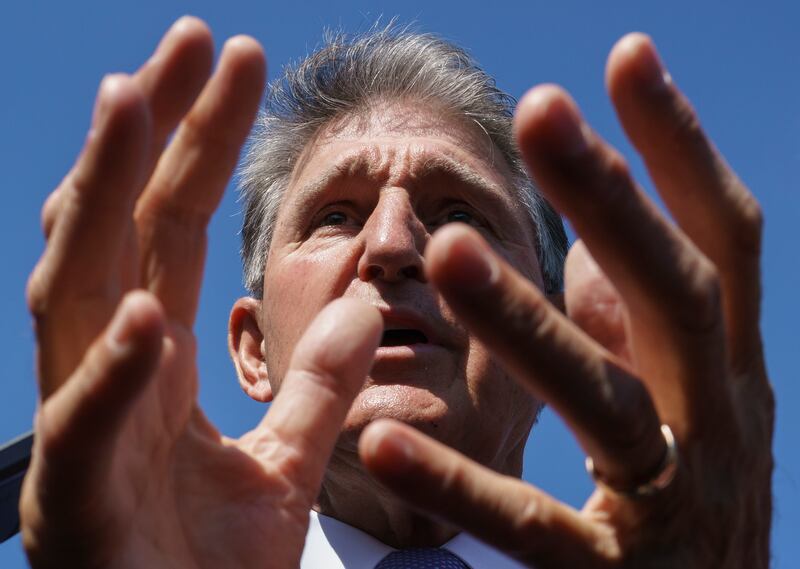 For months, the fate of Mr Biden's presidency seemed to be in the hands of Senator Joe Manchin, a conservative Democrat who rebuffed pleas for support a key spending bill. AP