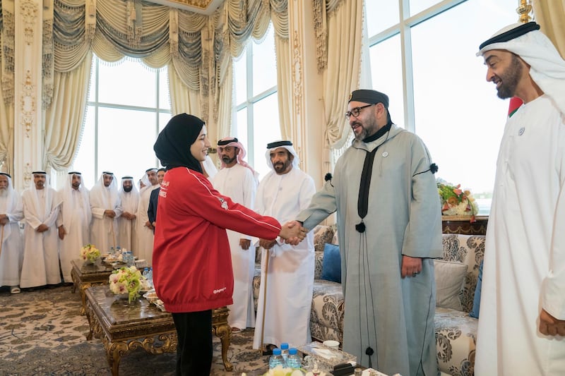 ABU DHABI, UNITED ARAB EMIRATES - September 10, 2018: HM King Mohamed VI of Morocco (2nd R), receives 18th Asian Games Jiu Jitsu winners, during a Sea Palace barza. Seen with HH Sheikh Mohamed bin Zayed Al Nahyan, Crown Prince of Abu Dhabi and Deputy Supreme Commander of the UAE Armed Forces (R) and HH Sheikh Saif bin Mohamed Al Nahyan (3rd R).

( Mohamed Al Hammadi / Crown Prince Court - Abu Dhabi )
---