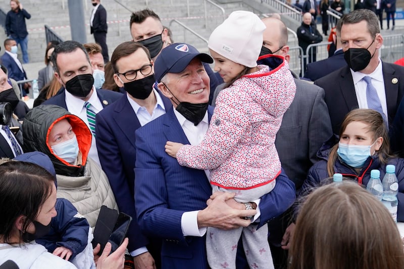 US President Joe Biden meets Ukrainian refugees at the PGE Narodowy Stadium in Warsaw during a visit to Poland. AP