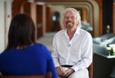 DUBAI, UNITED ARAB EMIRATES - APRIL 29:  CNBC's Middle East anchor, Hadley Gamble and Sir Richard Branson, Founder, Virgin Group and Chairman, Virgin Hyperloop One attend DP World Cargospeed launch aboard the Queen Elizabeth 2 on April 29, 2018 in Dubai, United Arab Emirates.  (Photo by Tom Dulat/Getty Images for CNBC)