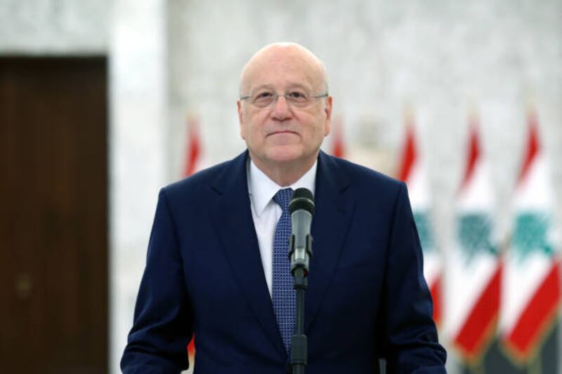 Najib Mikati, who was assigned to form a new government, holds a press conference after meeting with President Michel Aoun. Lebanese President's Office / Getty Images