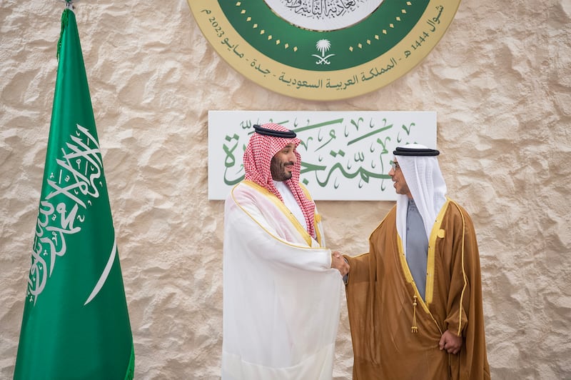 Sheikh Mansour bin Zayed, Vice President, Deputy Prime Minister and Minister of the Presidential Court, greets Saudi Crown Prince Mohammed bin Salman during the summit