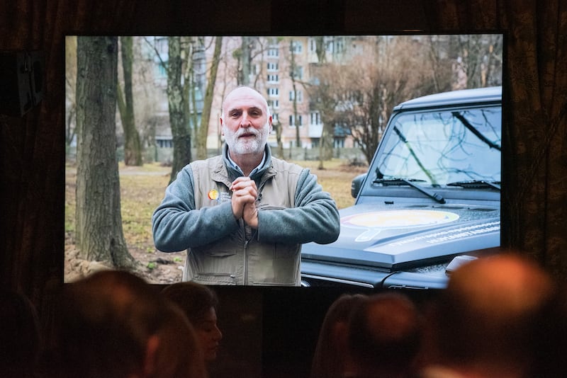 Jose Andres is seen on a screen giving a pre-recorded acceptance speech for receiving The Sophia Award for Excellence 2022 from Ukraine, while he works there to feed those affected by the war on March 31, 2022. EPA