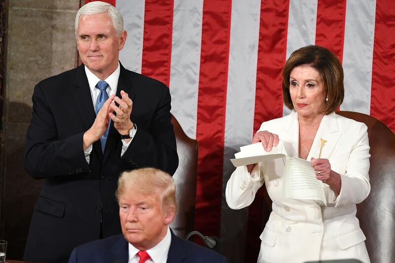 Speaker of the US House of Representatives Nancy Pelosi rips a copy of US President Donald Trump's speech after he delivered the State of the Union address at the US Capitol in Washington, DC.  AFP