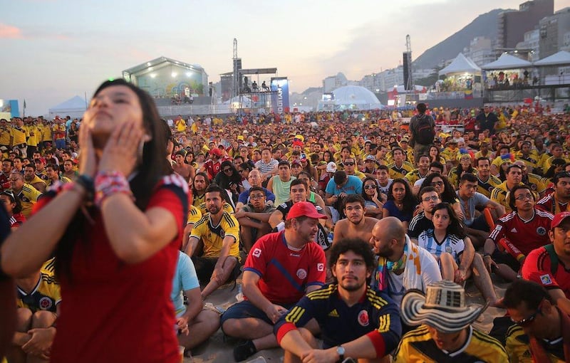 Fans gather on Copacabana Beach in Rio de Janeiro, Brazil, to watch Japan play Colombia at the 2014 World Cup. The beach will host fans again this year. Getty