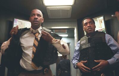 Washington and Chiwetel Ejiofor in the Spike Lee-directed action heist movie, Inside Man. Universal Pictures